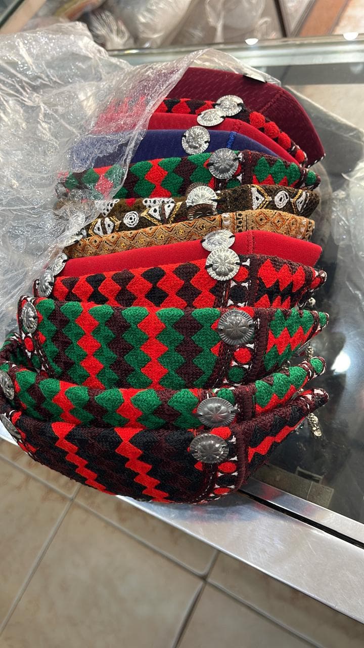 Traditional Balochi caps with metal medallion detailing