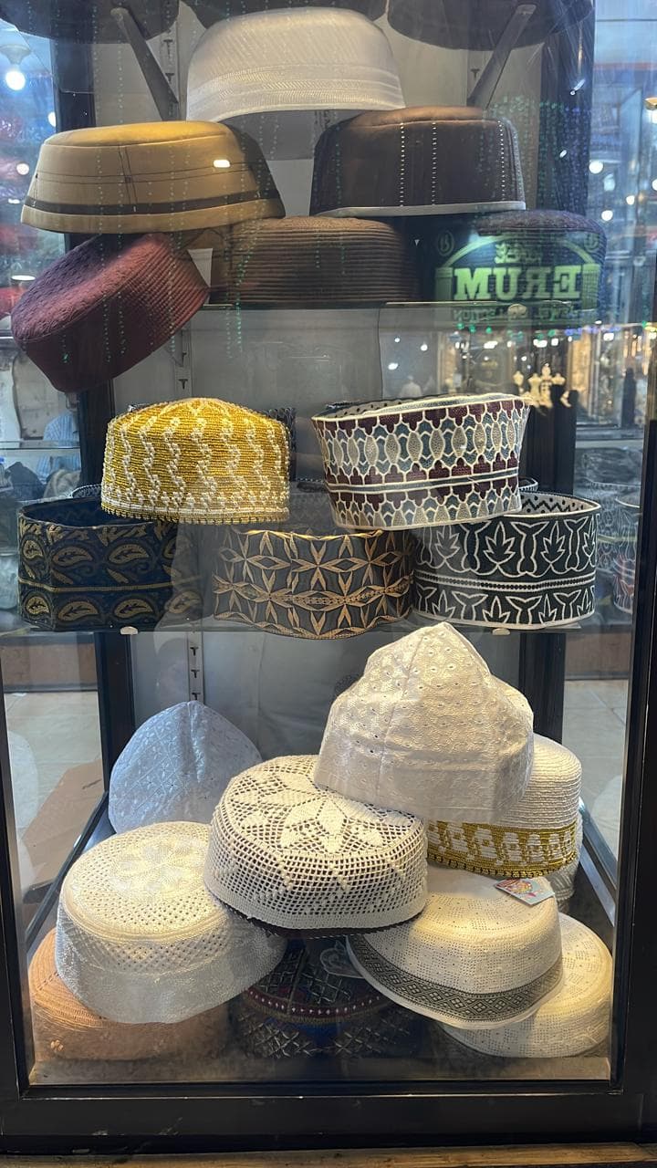 Display of prayer caps and koofi in crochet and embroidered styles