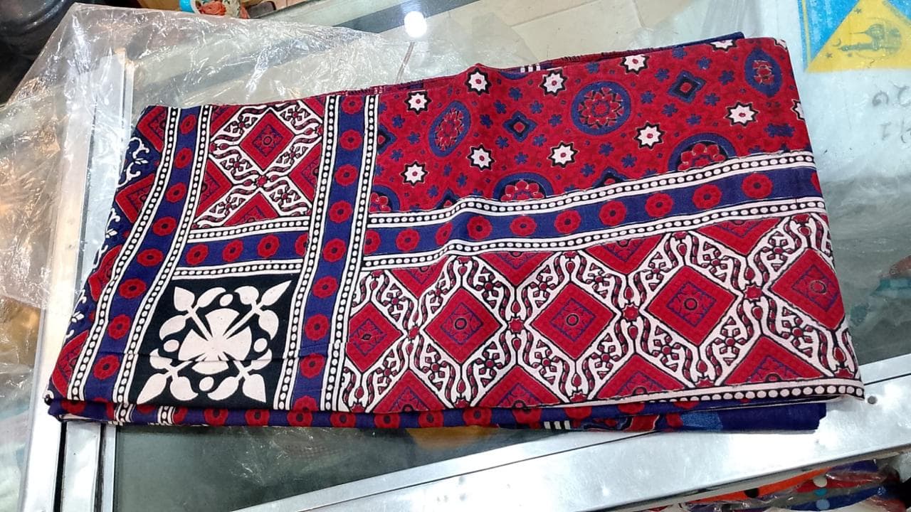 Folded Ajrak in red and blue traditional print