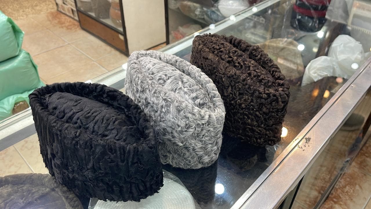 Karakul Jinnah caps in black, grey and brown curled wool